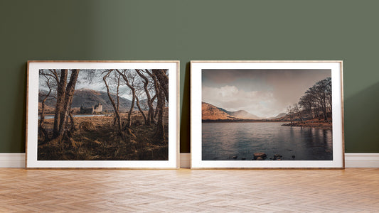 Kilchurn Castle on Loch Awe seen through gnarled trees, once MacGregor territory in Argyll, Scotland, photographed by Aly Wight