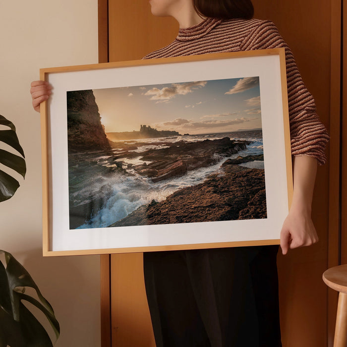 Wall with two framed landscape photograph prints of Clan Douglas Castles