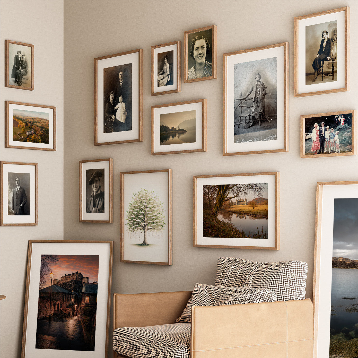 The corner of a modern room showing a large collection of framed prints displaying Scottish heritage and landscape photography prints on an ancestry wall.